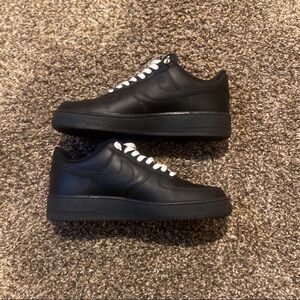 Nike black air force 1s